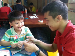 Look at the smiles on their faces! Making makes one happy indeed!