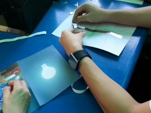 Making paper circuits with aluminium tapes as wires